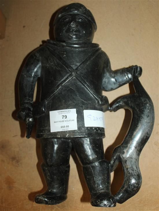 Inuit figure sculpture